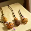 Estilo creativo colgante llavero de madera de ciprés chino, decoración para bolso, artesanía de madera, águila de ojos azules al por mayor