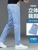 Fotos reales de jeans gruesos, elásticos, de corte ajustado, pierna recta para hombre para otoño e invierno, un pantalón largo casual moderno y versátil para hombres jóvenes