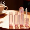 Pedido Jinze: Aplicador de Pincel Redondo Grueso, Tubo de Brillo de Labios Translúcido Rosa con Forma de Corazón, Material de Empaque de Tubo Vacío de Plástico