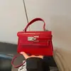 Bolsa de Ombro Transversal Trapezoidal Feminina Moda 2026 Texturizada Padrão Crocodilo Grande Capacidade Simples Elegante para o Dia a Dia