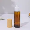 Botella de Loción de Vidrio Marrón Opaca Botella Vacía Botella con Atomizador de Presión Botella Cosmética Tapa con Textura de Madera Botella de Muestra Portátil
