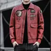 Ropa de cuero pu para hombre 2021 ropa para hombre con solapa bordada ropa de motocicleta primavera y otoño chaqueta de cuero casual de moda para hombre procesamiento personalizado