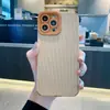 La nueva carcasa blanda de veta vertical es adecuada para iphone15promax dos colores ojos de ángel 14 cuatro esquinas 13 protección 12 juegos de 11 cuero