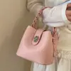 Bolso cubo texturizado de comercio exterior transfronterizo para mujer, 26 modelos nuevos, bolso de mano de alta estética casual, bolso versátil de hombro y cruzado