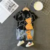 Fuente transfronteriza 23 ropa de bebé para niños dibujos animados cuello redondo manga corta pantalones cortos conjunto de dos piezas ropa para niños verano nueva ropa de verano