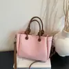 Bolso de mano elegante y versátil para mujer, nuevo diseño moderno 2026, adecuado para ir al trabajo, se puede llevar en la mano o usar como bolso de hombro o bolso cruzado