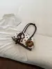 Bolso pequeño de lunares de moda estilo coreano para mujer, nuevo y moderno bolso de bolos retro de alto valor, bolso de hombro para debajo del brazo