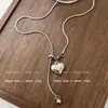 Tendência dos Tempos!Colar de Puxar com Pingente de Coração para Mulheres, Simples de Nicho Leve Luxo Alto Padrão Longo de Aço Titânio
