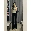 Jeans amarillos pequeños desgastados de microcampana para mujer Primavera y Otoño Nuevos Pantalones largos de herradura de cintura alta adelgazantes