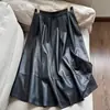 Otoño 2026 Nuevo Estilo Vintage de Moda Falda de Cuero Proteico de Longitud Media Falda con Pliegues Cintura Elástica Venta al por Mayor H20CQ8505