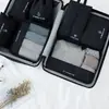 Nova bolsa de armazenamento catiônica à prova d'água de sete peças para viagem bolsa organizadora de bagagem multi-especificação roupa íntima terno portátil