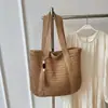 Bolso de hombro tejido para playa de gran capacidad y versátil, nuevo bolso de paja de color liso para vacaciones junto al mar, bolso de mano