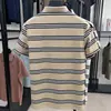 Camiseta de algodón con rayas teñidas en hilo y cuello de solapa para hombre, nueva de verano 2025, jacquard a rayas, casual, transpirable, polo para hombre