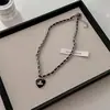 2023 nuevo collar para mujer corto de amor con incrustaciones de diamantes tejido de cuero diseño de nicho collar para clavícula