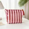 Nova Bolsa de Maquiagem Listrada Brilhante de PVC Impermeável Grande Capacidade Necessaire Bolsa de Armazenamento Portátil para Viagens de Negócios