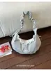 Bolsa de ombro plissada floral estilo coreano inspirada em ins para mulheres, novo modelo 2026, bolsa transversal casual versátil de grande capacidade para o dia a dia