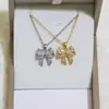 Collar de cobre con forma de lazo irregular con circonita cúbica microincrustada, con diseño de lazo en forma de corazón, un accesorio de moda ligero y versátil