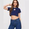 Verão Atravessando Fronteiras AliExpress 2024 Novo Estilo Europeu e Americano Elegante Gola Redonda Manga Curta Estampada Curta Ombro a Ombro Camiseta Top