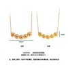 Polvo de Oro Diamante Tachonado Riqueza Continua Abundancia de Dinero Set Lujo Ligero Incrustado Diamante Rojo Atracción de Riqueza Moneda de Cobre Collar Pendientes Anillo Venta al por Mayor