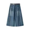Otoño temprano 2026 modernos nuevos pantalones vaqueros cropped de retazos retro de cintura alta versátiles de pierna ancha efecto adelgazante