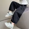 Pantalones Curvos de Pierna con Estrellas Completas Estilo Coreano para Niñas Estilo Primavera/Otoño 2026 Nueva Moda Infantil Pantalones Largos Casuales Elegantes para Niñas Pequeñas