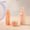 Botellas de set cosmético, botellas dispensadoras de loción, botellas de sérum, botellas con bomba dosificadora de limpieza de 100 ml, botellas de crema de boca ancha degradadas