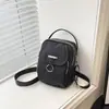 Bolso bandolera moderno y elegante para mujer, bolso de hombro de color liso, nuevo bolso para teléfono de estilo coreano casual y simple primavera 2026