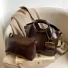 Comercio exterior transfronterizo bolsa pequeña portátil para mujer 2024 nuevo estilo retro europeo y americano bolso bandolera moda bolso cubo al por mayor