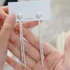 Aretes de Borla Perla Plateada para Mujer 2025 Nuevo Estilo Caliente Pendientes Elegantes que Modifican el Rostro Pendientes de Gama Alta y Hermosos
