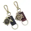 Nuevo colgante de aleación despertador retro llavero de piel de vaca joyería para hombre llavero de coche suministro de comercio electrónico transfronterizo