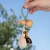 Sino dos Ventos Pendente de Casca de Fruta de Planta Natural Indonésia Kit de Materiais DIY Feito à Mão Sino dos Ventos Natural Estilo Floresta Decoração para Pendurar no Carro