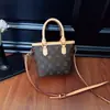 Bolso Cubo Estampado Retro de Comercio Exterior para Mujer 2026 Nuevo Elegante Diseño de Nicho Versátil Bolso de Mano Cruzado de un Solo Hombro