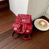Mochila de corrente acolchoada estilo Chanel para mulheres, novo modelo 2026, bolsa de mão casual versátil de nicho de alta qualidade, mochila pequena