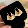 Elegante HerederaEstilo Fresco Bolso de Lunares Plateados Arete Arete Único Mujer 2026 Aretes Súper Hermosos