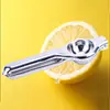 Exprimidor de limón de acero inoxidable no magnético al por mayor Pinza para limón Prensa para naranja