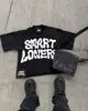 Camiseta Redonda de Manga Corta con Estampado de Graffiti en Inglés 2026 Top Versátil Estilo Casual Top de Algodón Más Vendido