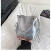 Bolso cruzado de un solo hombro moderno y único, bolso casual de tendencia de nuevo estilo, bolso tipo cubo para mujer con diseño de nicho Primavera 2026