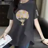 Comercio electrónico transfronterizo pedido final marca grande etiqueta cortada mostrador comercio exterior ropa de mamá para mujer camiseta de manga corta suelta con estampado de dibujos animados top