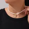 Estilo Chic Elegante Personalidad Sencilla Colgante de Concha Blanca Incrustada Joyería Perla de Agua Dulce con Cuentas Sentido del Diseño Collar de Acero de Titanio