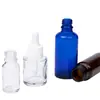 Venta al por mayor de fábrica Botella transparente de 5 ml para aceites esenciales Botella de vidrio de 10 ml Sub-botella cosmética de 50 ml