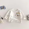 Camisetas de Primavera e Outono para Meninos e Meninas, Tops Tendência Estilosos Versão Coreana com Listras Desenho Animado e Bolso