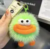 Lindo Colgante para Llaves de Coche Colgante de Bola de Carbón Pequeña con Boca Grande Colgante para Bolso Muñeca de Bola de Felpa Juguete