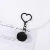 Llavero de corazón con pompón de colores, hebilla creativa de corazón hueco de dopamina, accesorio para bolso, adorno de regalo, colgante de cuentas