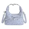 Bolsas de Nicho Super Populares para Primavera e Verão para Mulheres 2026 Nova Moda Versátil Bolsa de Ombro Transversal Bolsa de Mão Pequena Exquisita