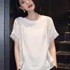 Camiseta Branca de Manga Curta com Patchwork de Renda para Mulheres 2026 Novo Verão Design Solto com Detalhes Elaborados Vazados Top