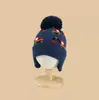 Set de dos piezas de gorro con temática de dinosaurios, nuevo estilo otoño/invierno, gorro para bebé que cubre las orejas, gorro de punto unisex, disponible para producción personalizada