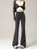 Pantalones casuales de corte ajustado, ligeramente acampanados y forrados de polar para otoño e invierno 2026, elegantes, estilizan la figura, versátiles y adecuados para el trabajo o el ocio, diseñados para un look relajado y con estilo.