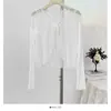 Cardigan de Punto Calado de Encaje Fino de Manga Larga con Cuello en V Verano 2026 Nuevo Top Corto Cubre-Pantalón con Cordones