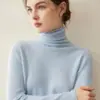 Suéter de cachemira pura 2026 invierno nuevo para mujer primera línea listo para usar camisa base estilo elegante holgado adelgazante cálido suéter