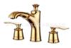 Kaiping Youjia grifo de lavabo dividido para baño titanio estilo europeo tres agujeros lavabo grifo extraíble frío y caliente 30775
